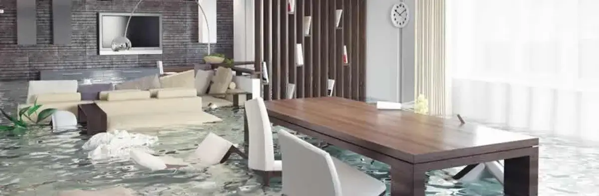 home interior affected by water damage with flooded floors and displaced furniture in Columbia, SC